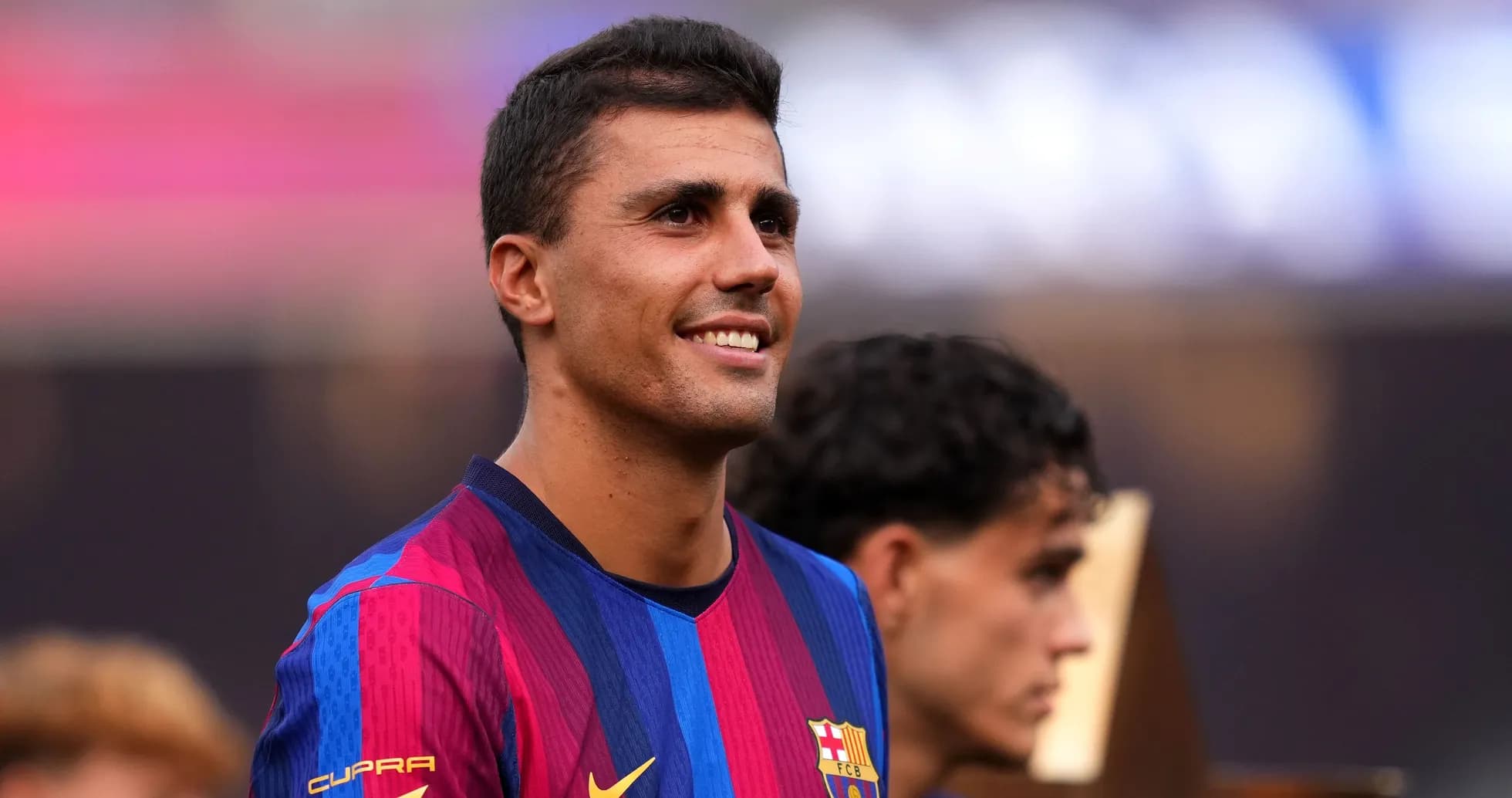 Jugador de Barcelona sonriendo en evento