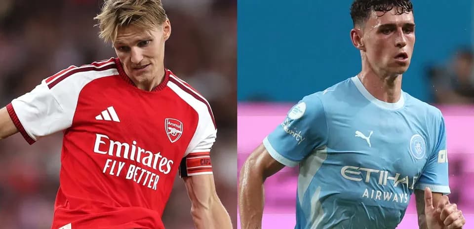 Jugadores de Arsenal y Manchester City durante el partido