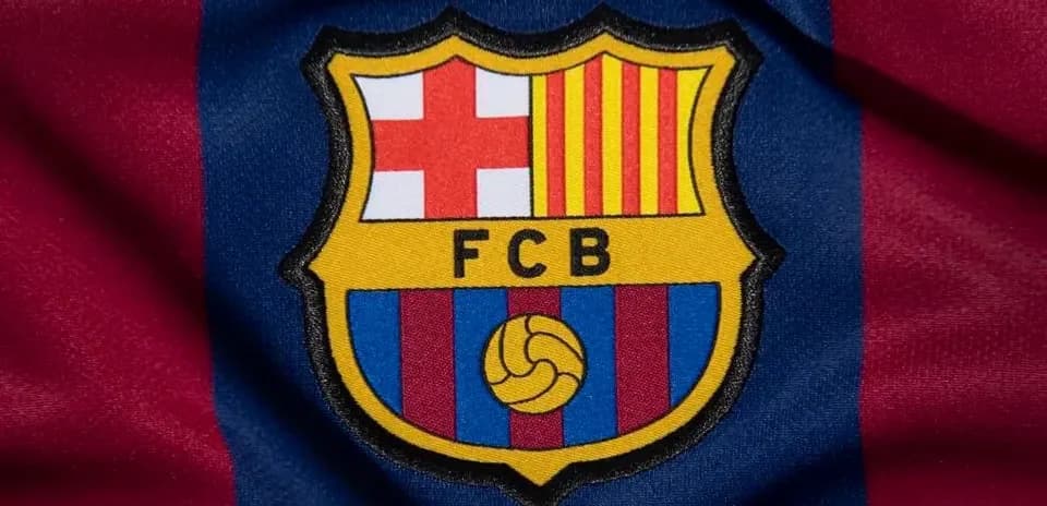 Escudo del FC Barcelona en fondo de tela