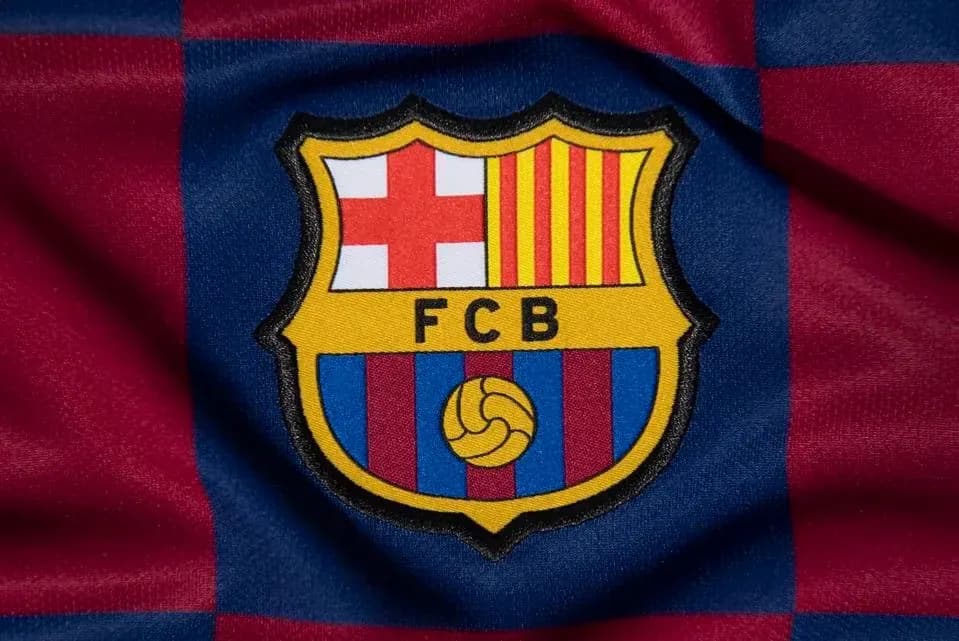 Escudo del FC Barcelona en fondo de tela