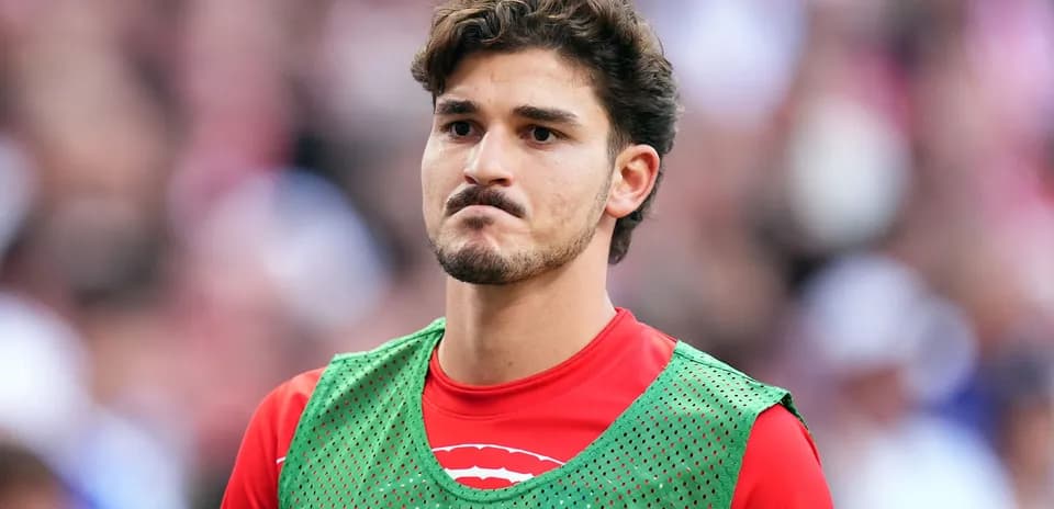 Jugador en la banca durante el partido
