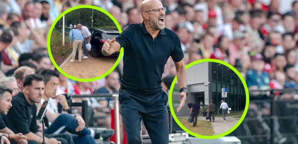 Entrenador dirigiéndose a la banca durante el partido