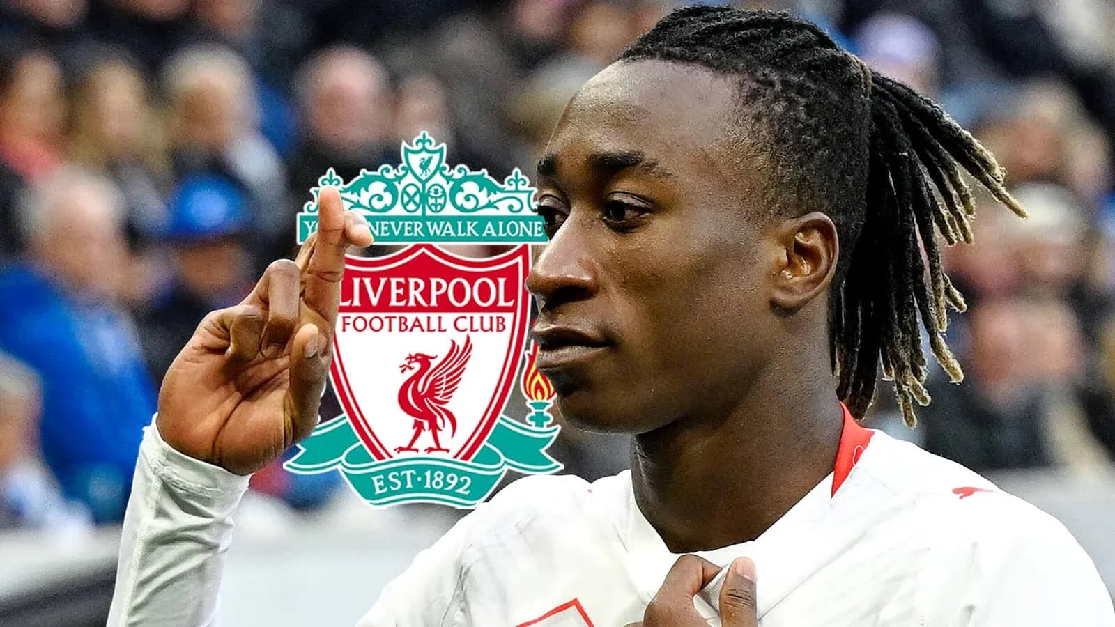 Jugador de Liverpool señalando con un dedo