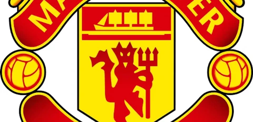 Logotipo de Manchester United en colores rojo y amarillo