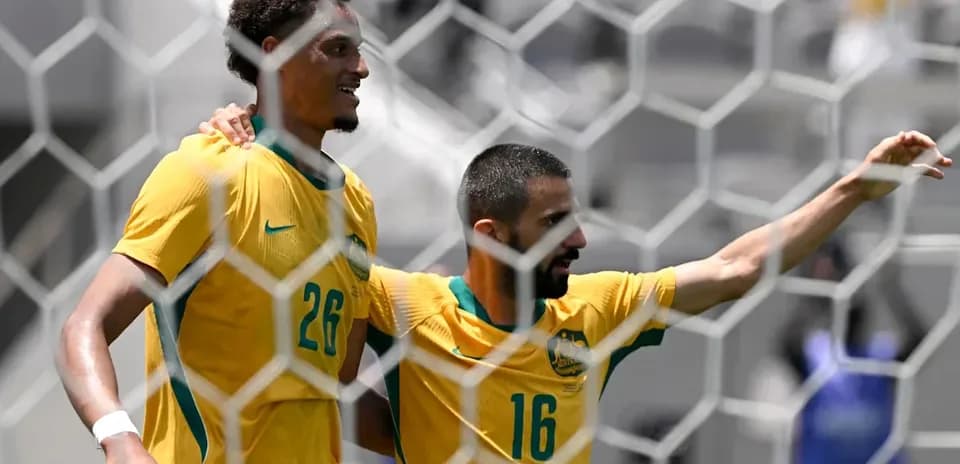 Jugadores australianos celebrando en el campo de juego
