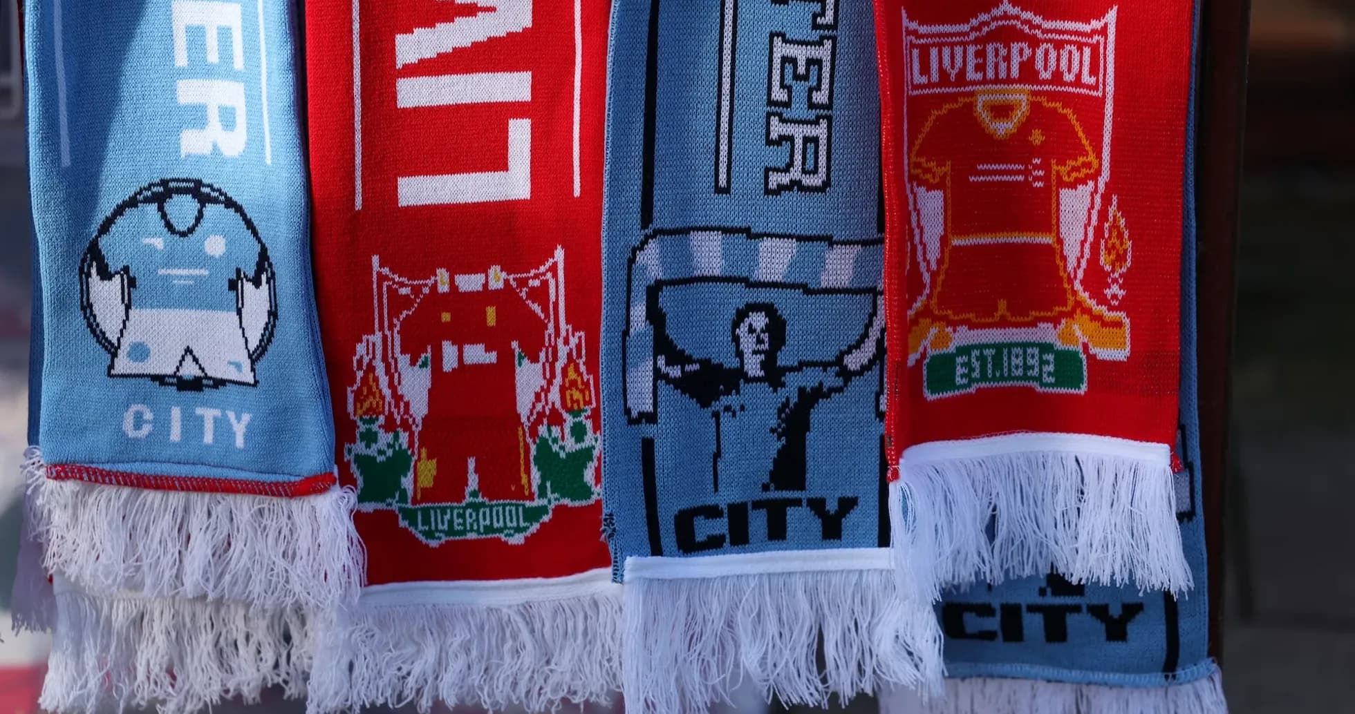 Bufandas de Liverpool y Manchester City