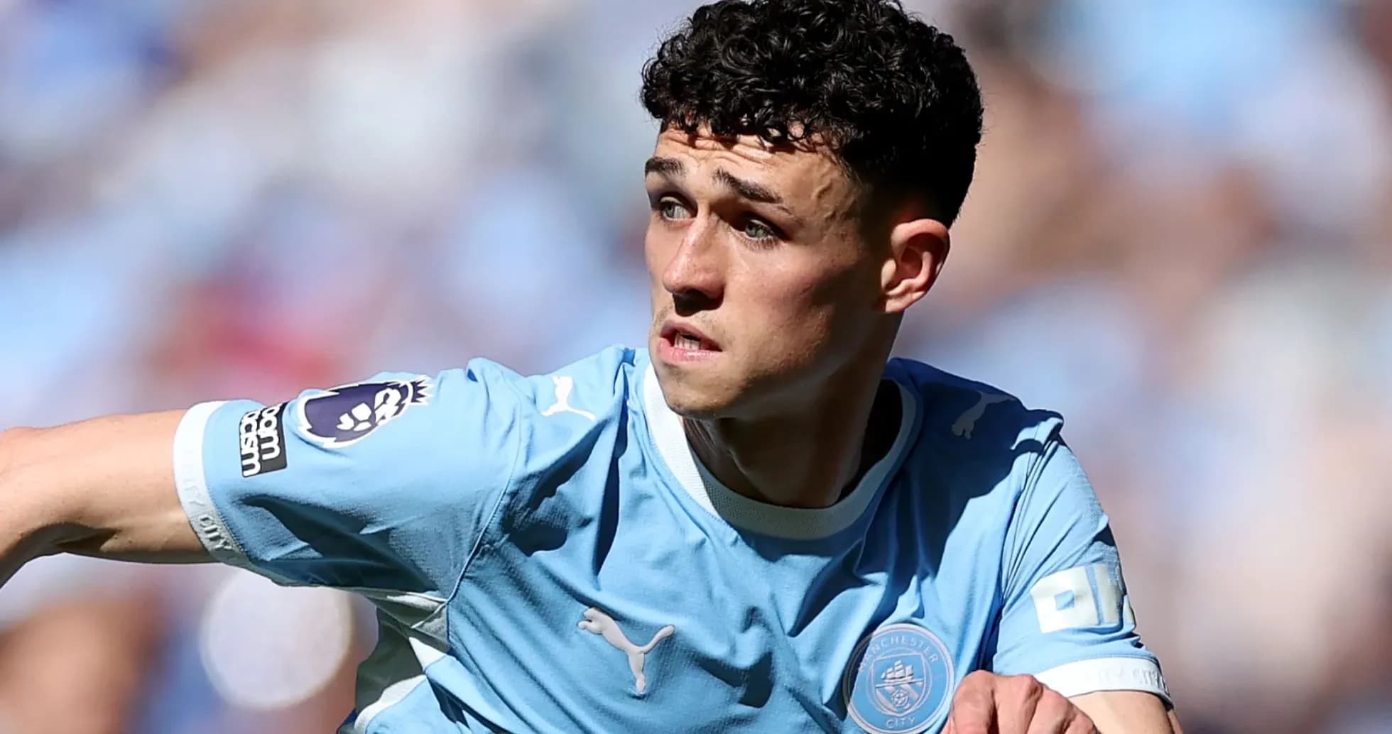 Jugador de Manchester City en acción durante el partido