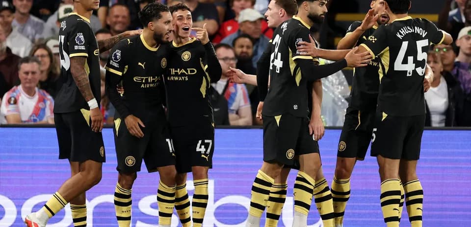 Jugadores de Manchester City celebrando un gol