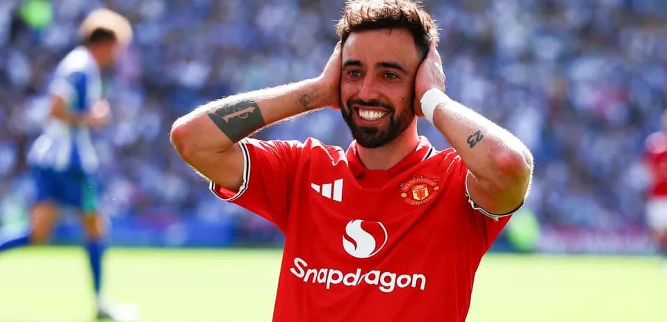 Jugador de Manchester United celebrando en el campo