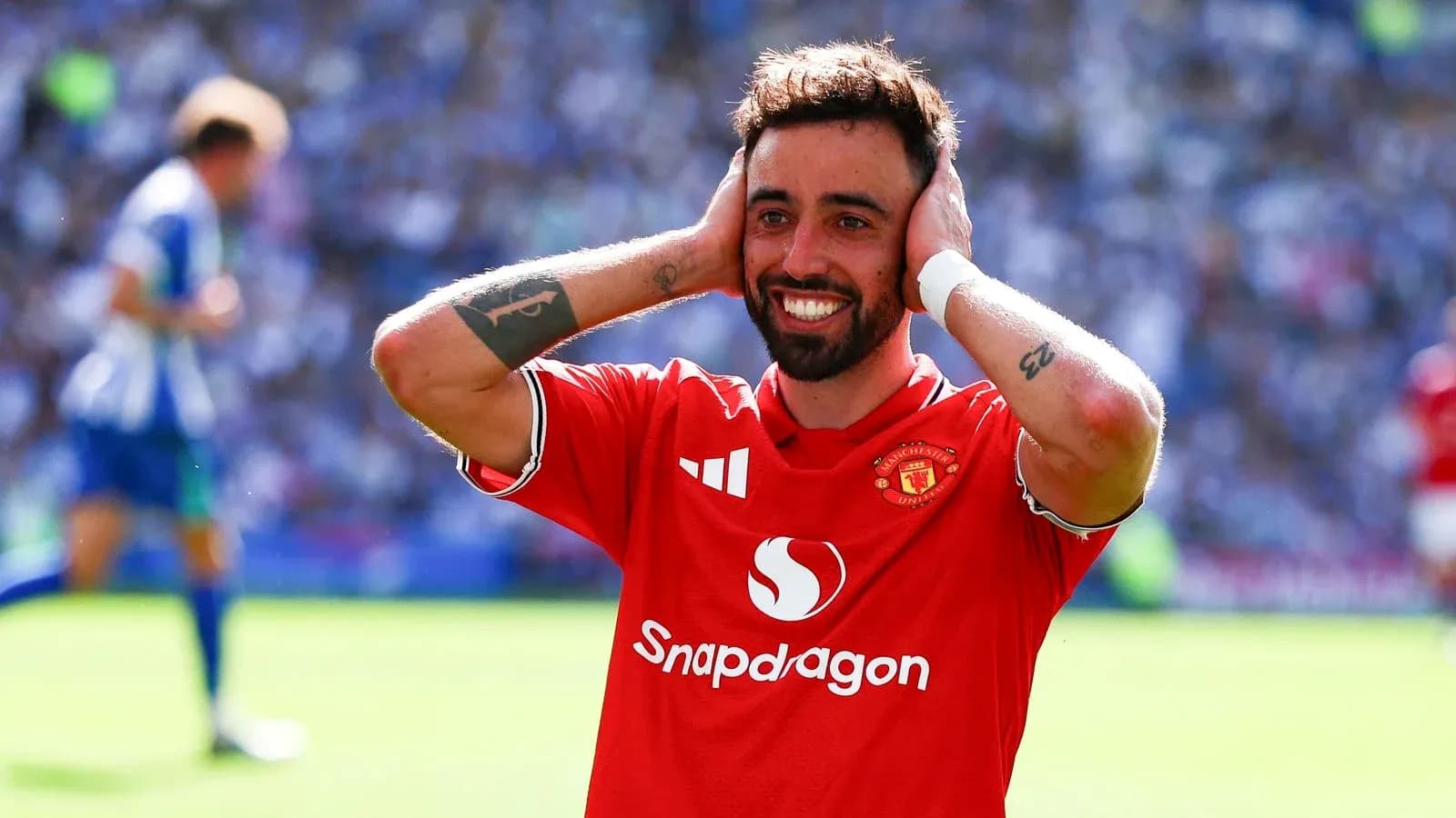 Jugador de Manchester United celebrando en el campo