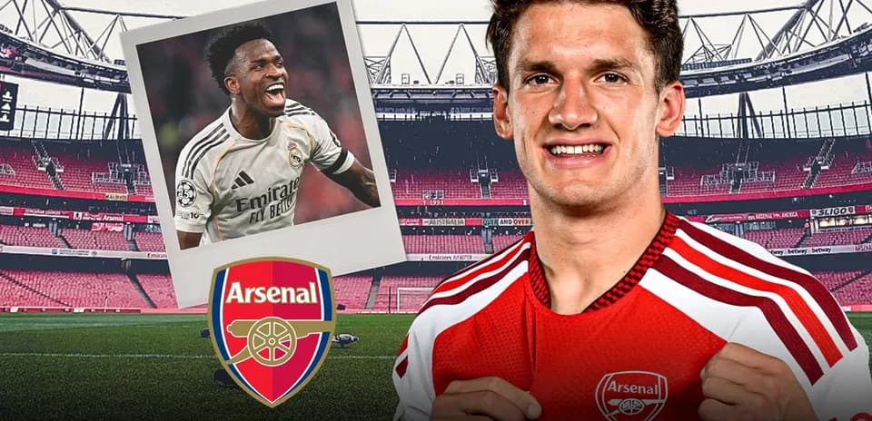 Jugador de Arsenal posando con camiseta en estadio
