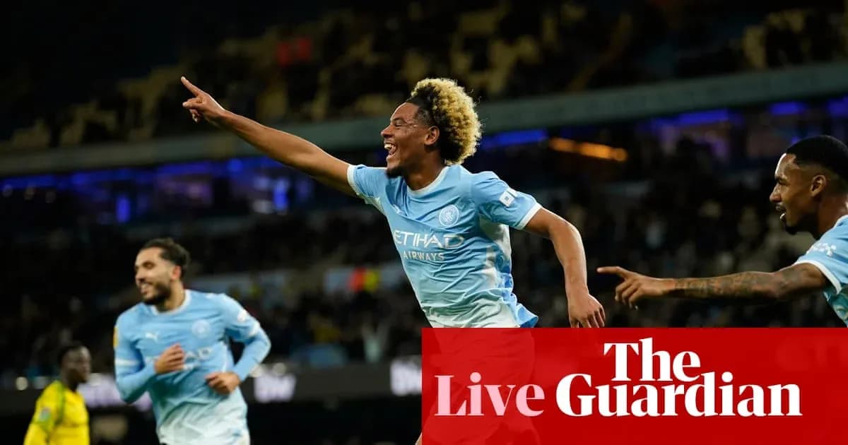 Jugador de Manchester City celebrando un gol en el estadio
