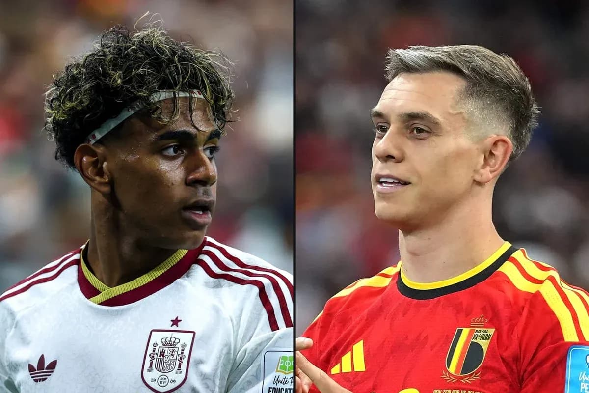 Jugadores de España y Bélgica en el campo