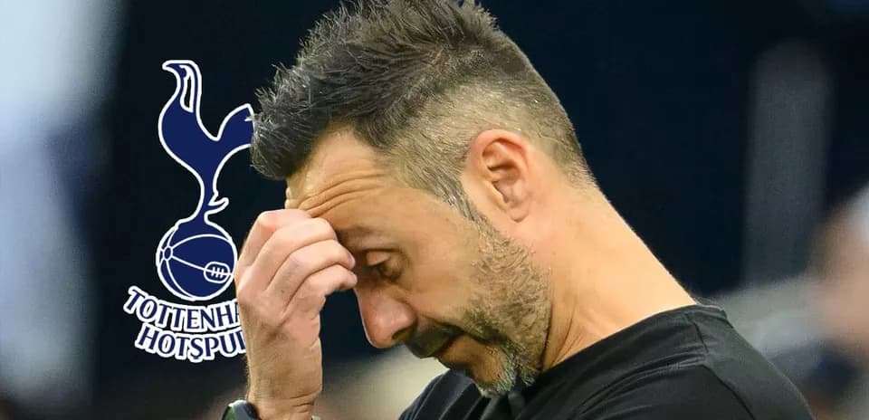 Entrenador de Tottenham Hotspur mirando hacia abajo