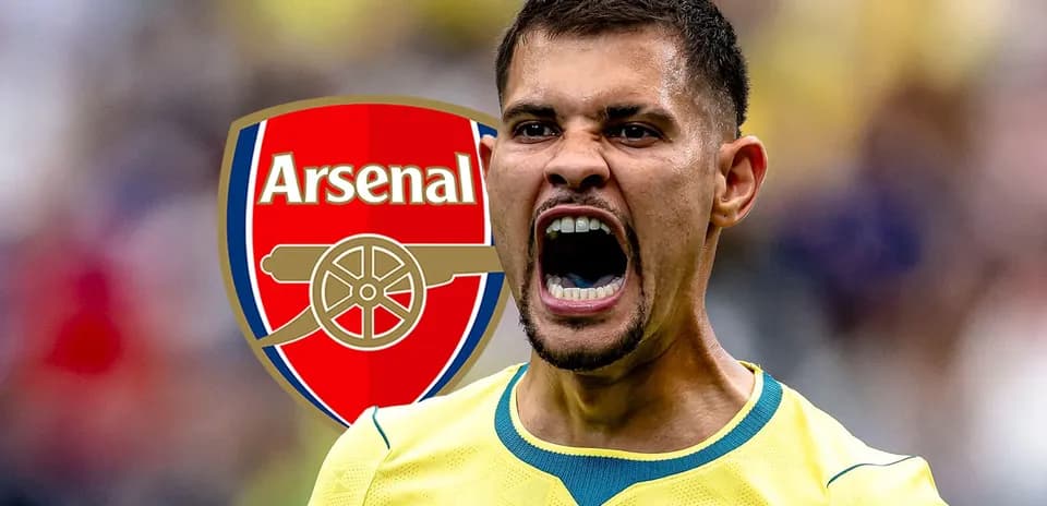 Jugador gritando con el logo de Arsenal detrás