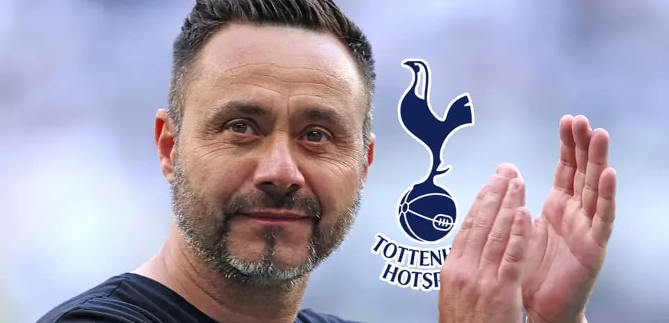 Entrenador aplaudiendo con logo de Tottenham Hotspur
