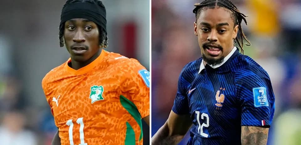 Jugadores de fútbol de Costa de Marfil y Francia en acción