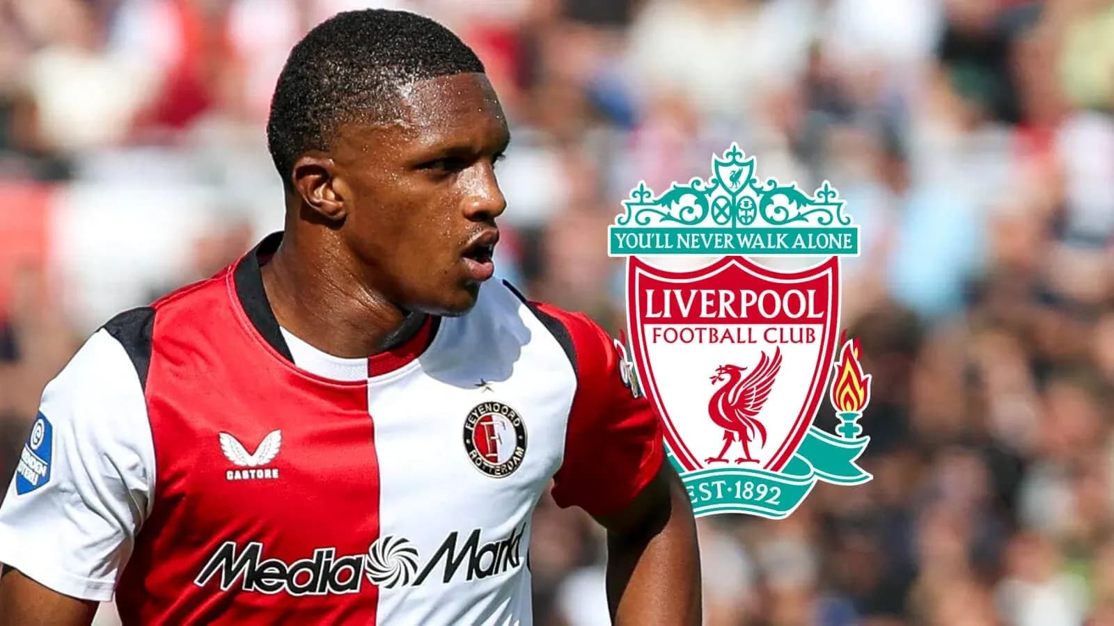 Jugador de Feyenoord corriendo con logo de Liverpool
