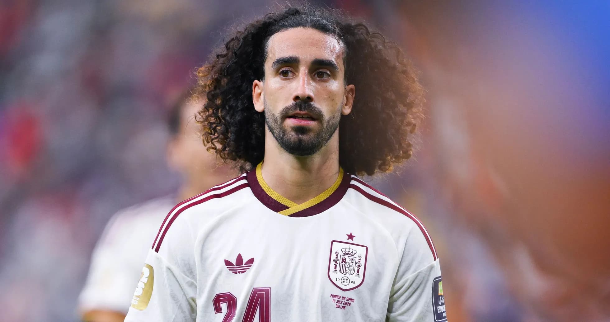 Jugador de España con camiseta blanca en el campo