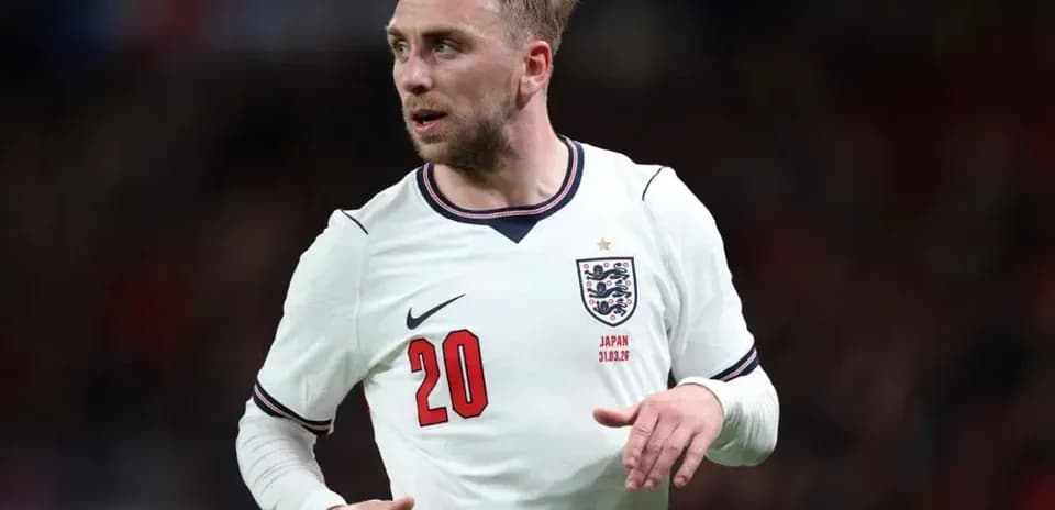 Jugador con camiseta de Inglaterra en acción