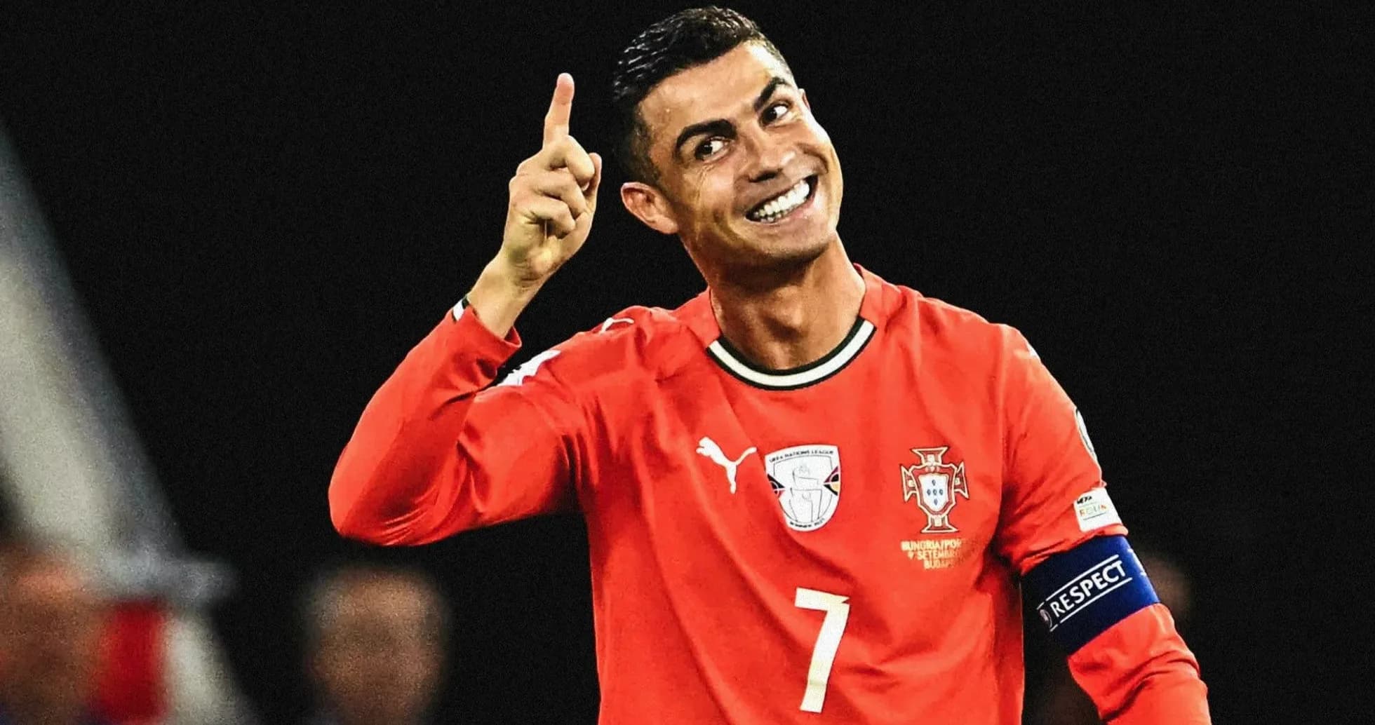 Jugador de Portugal celebrando en partido de fútbol Jugador de Portugal celebrando en partido de fútbol