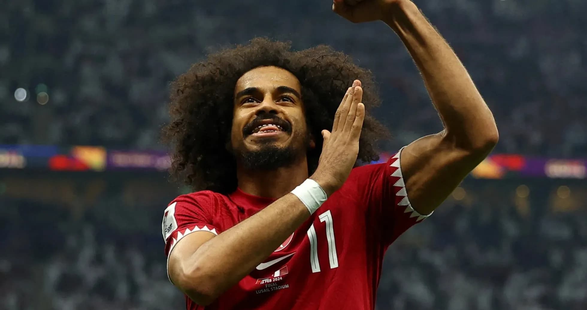 Jugador de Qatar celebrando en el estadio Jugador de Qatar celebrando en el estadio