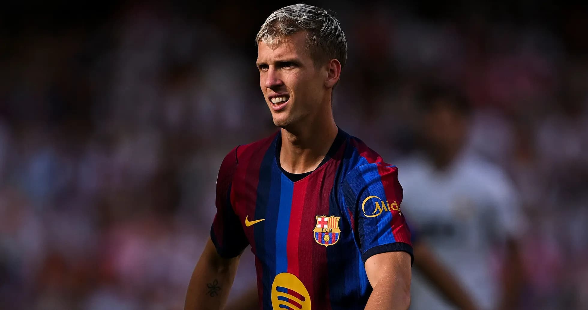 Jugador de Barcelona en acción durante el partido Jugador de Barcelona en acción durante el partido