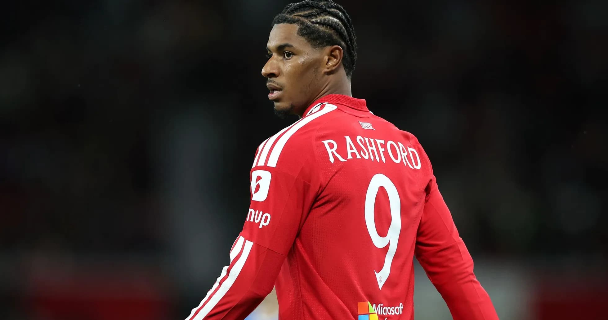 Jugador de Manchester United con camiseta roja y número 9 Jugador de Manchester United con camiseta roja y número 9