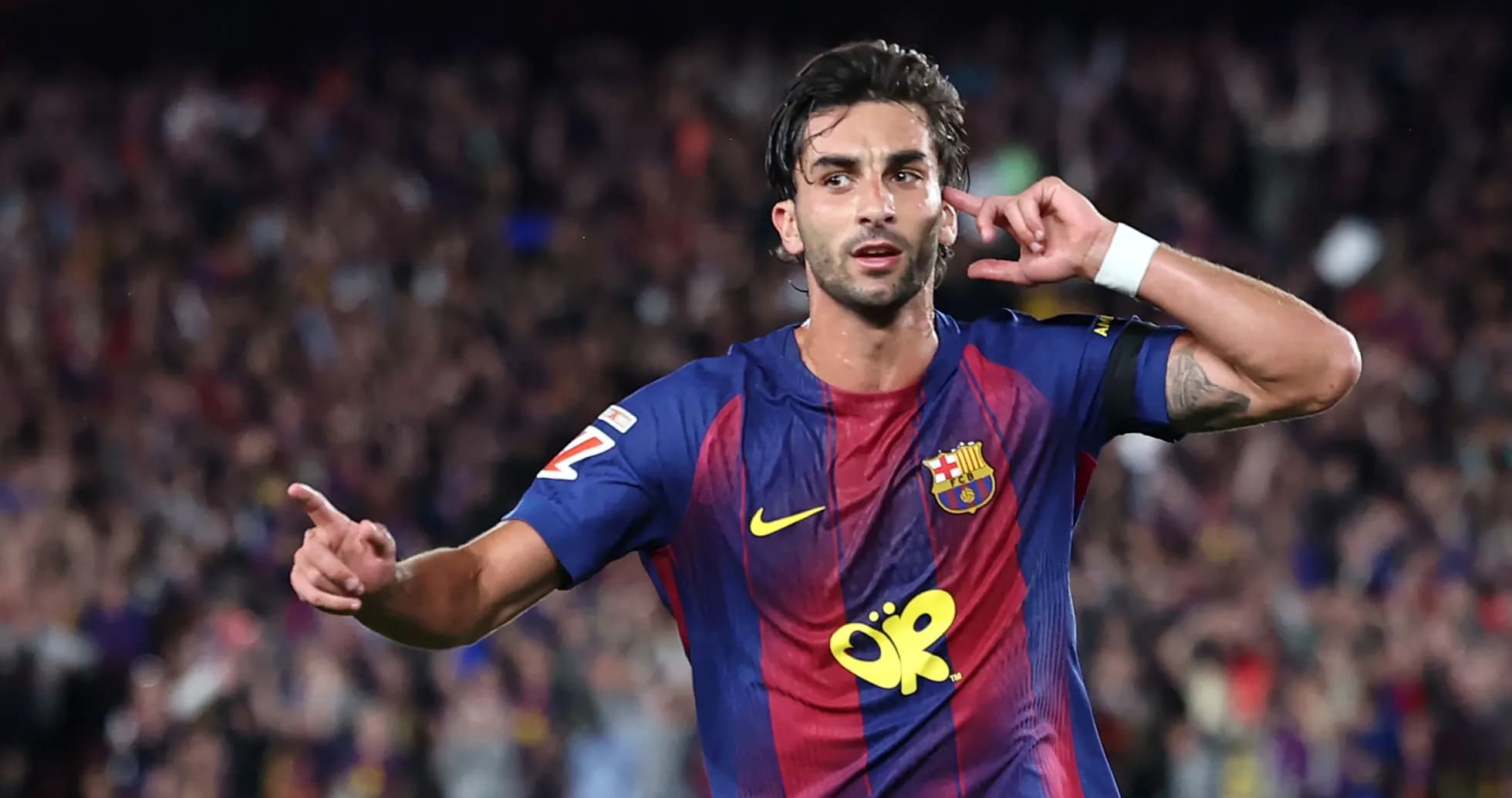 Jugador de Barcelona celebrando un gol en el estadio Jugador de Barcelona celebrando un gol en el estadio