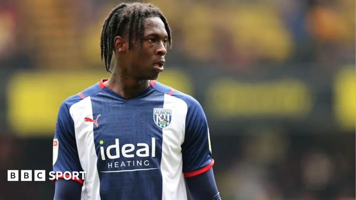 Jugador de West Bromwich Albion en acción Jugador de West Bromwich Albion en acción